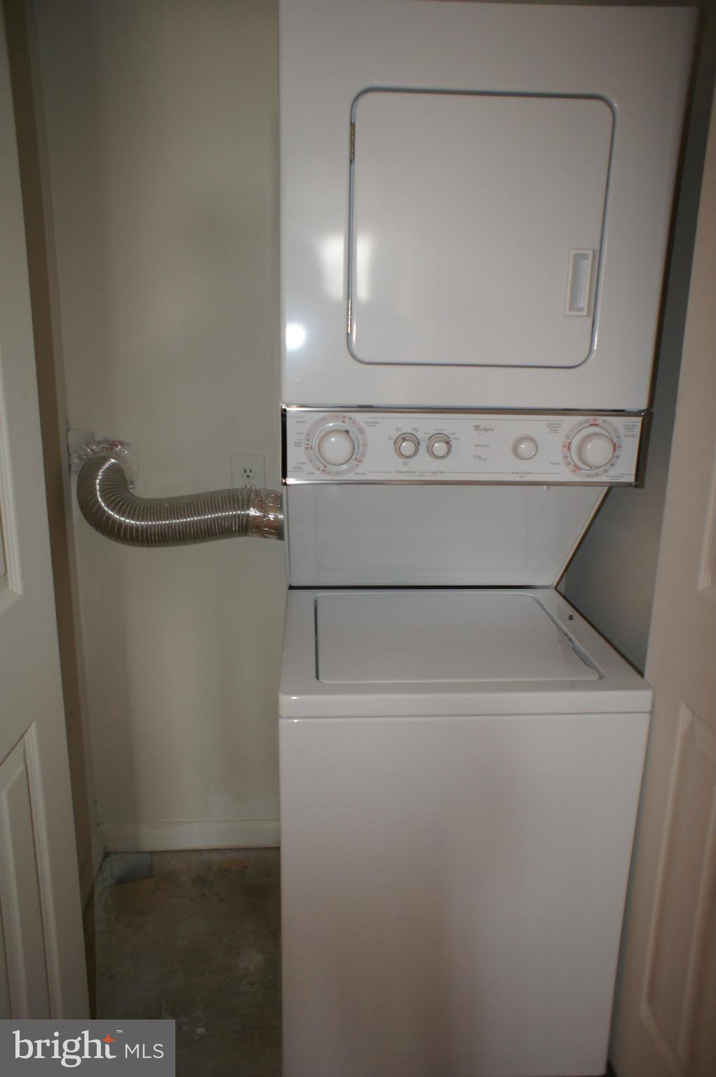 2220 Castle Rock Square, Unit 12C Reston, VA 20191 - Photo 12 of 16 a close up view of washer and dryer