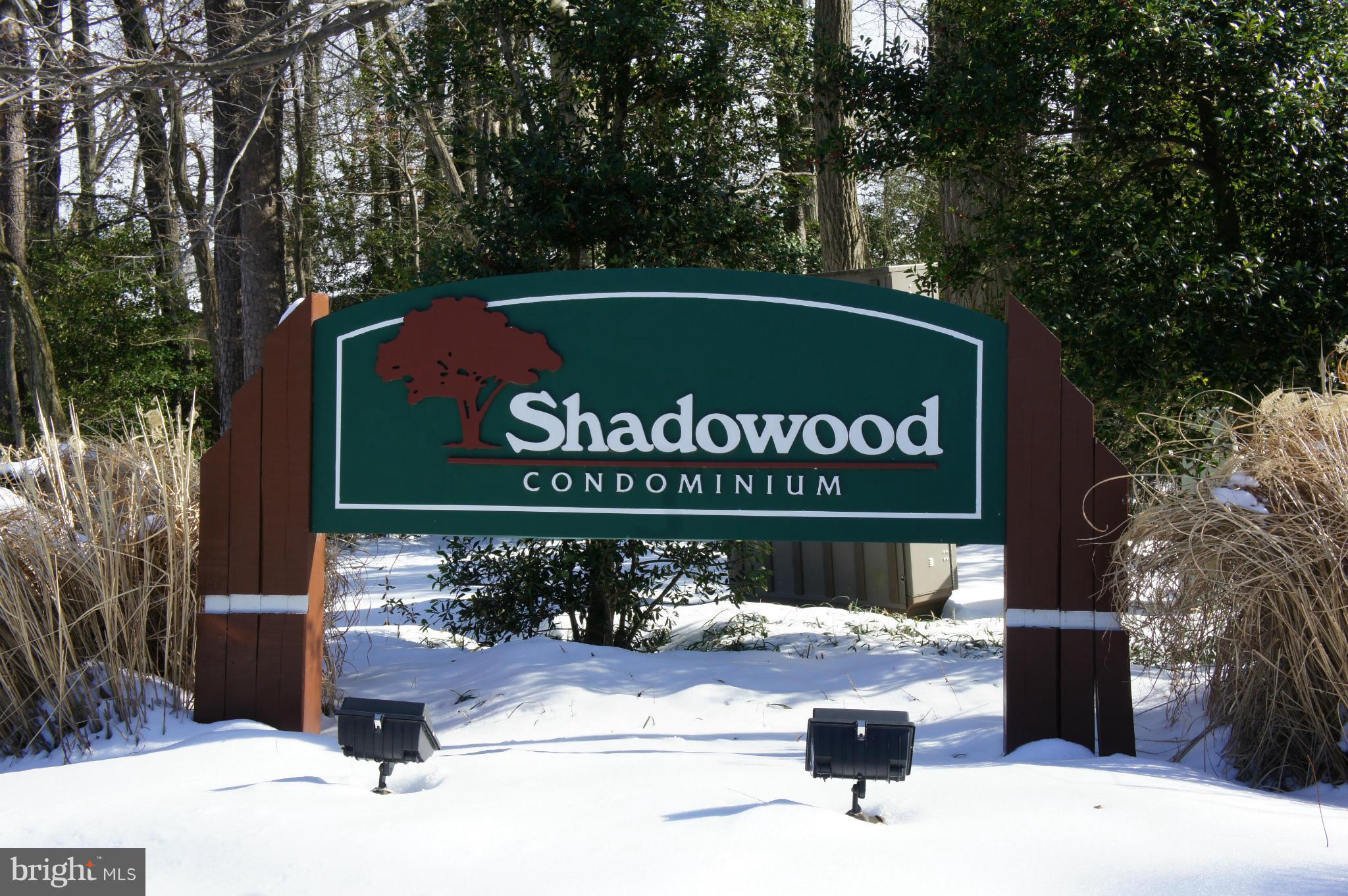 2220 Castle Rock Square, Unit 12C Reston, VA 20191 - Photo 15 of 16 a sign broad on the side of the road