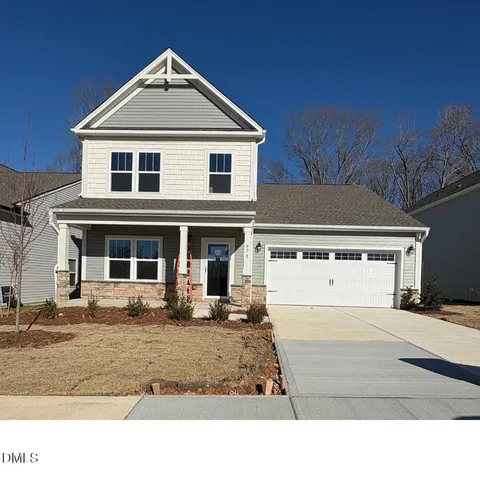 a black and white photo of a house