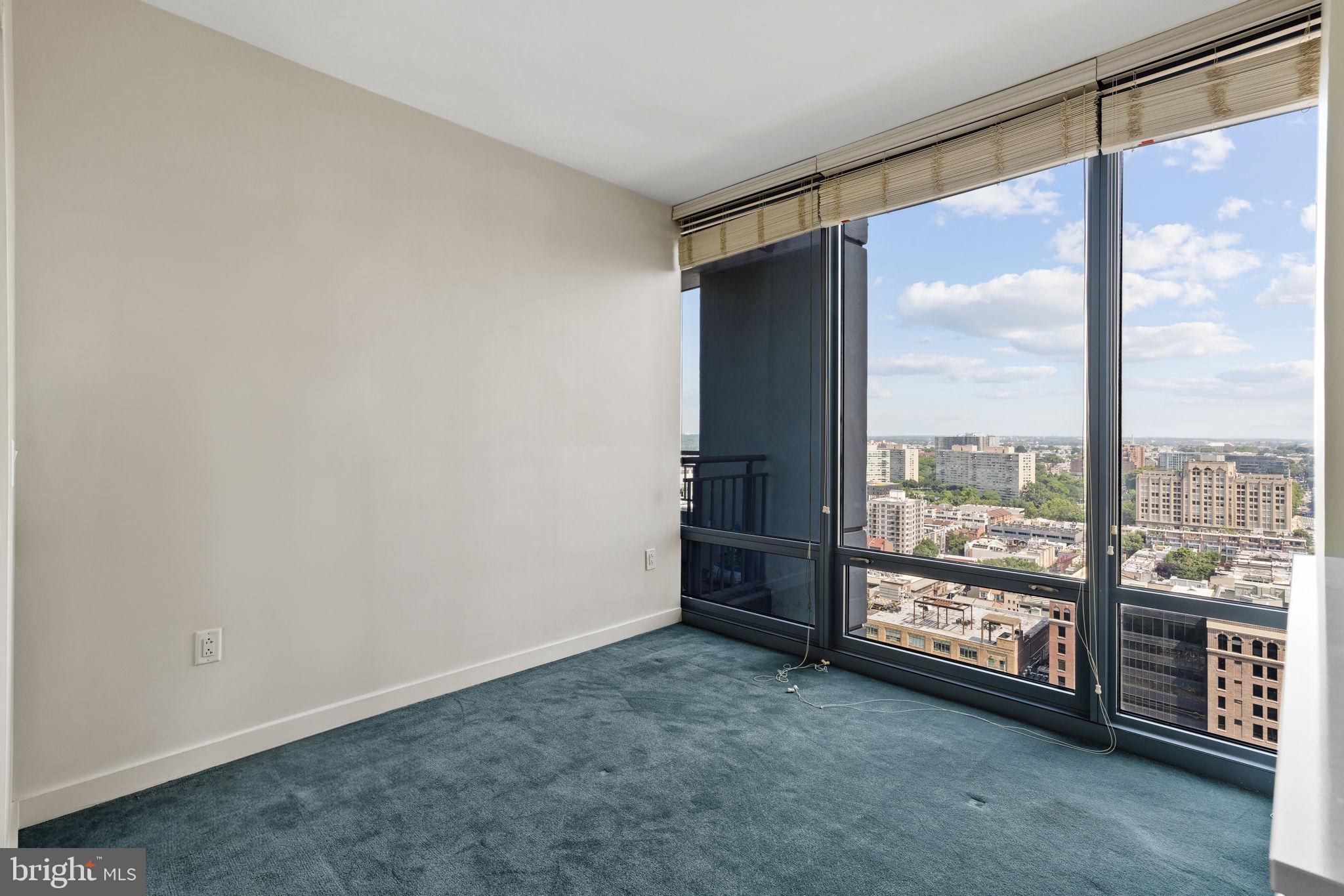 2101 Market Street, Unit 2007 Philadelphia, PA 19103 - Photo 18 of 45 wooden floor in an empty room with a window