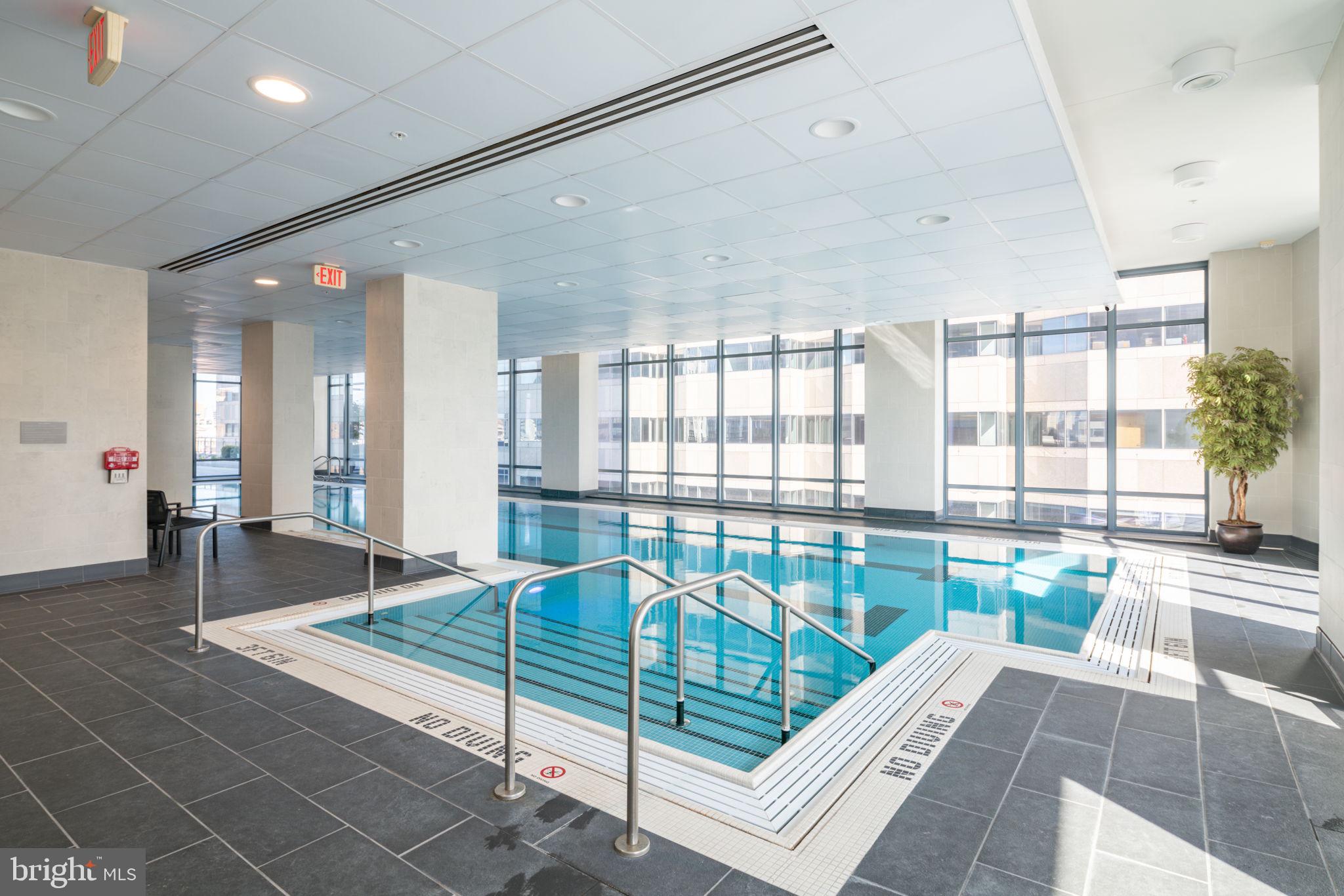 2101 Market Street, Unit 2007 Philadelphia, PA 19103 - Photo 39 of 45 a living room with a large window