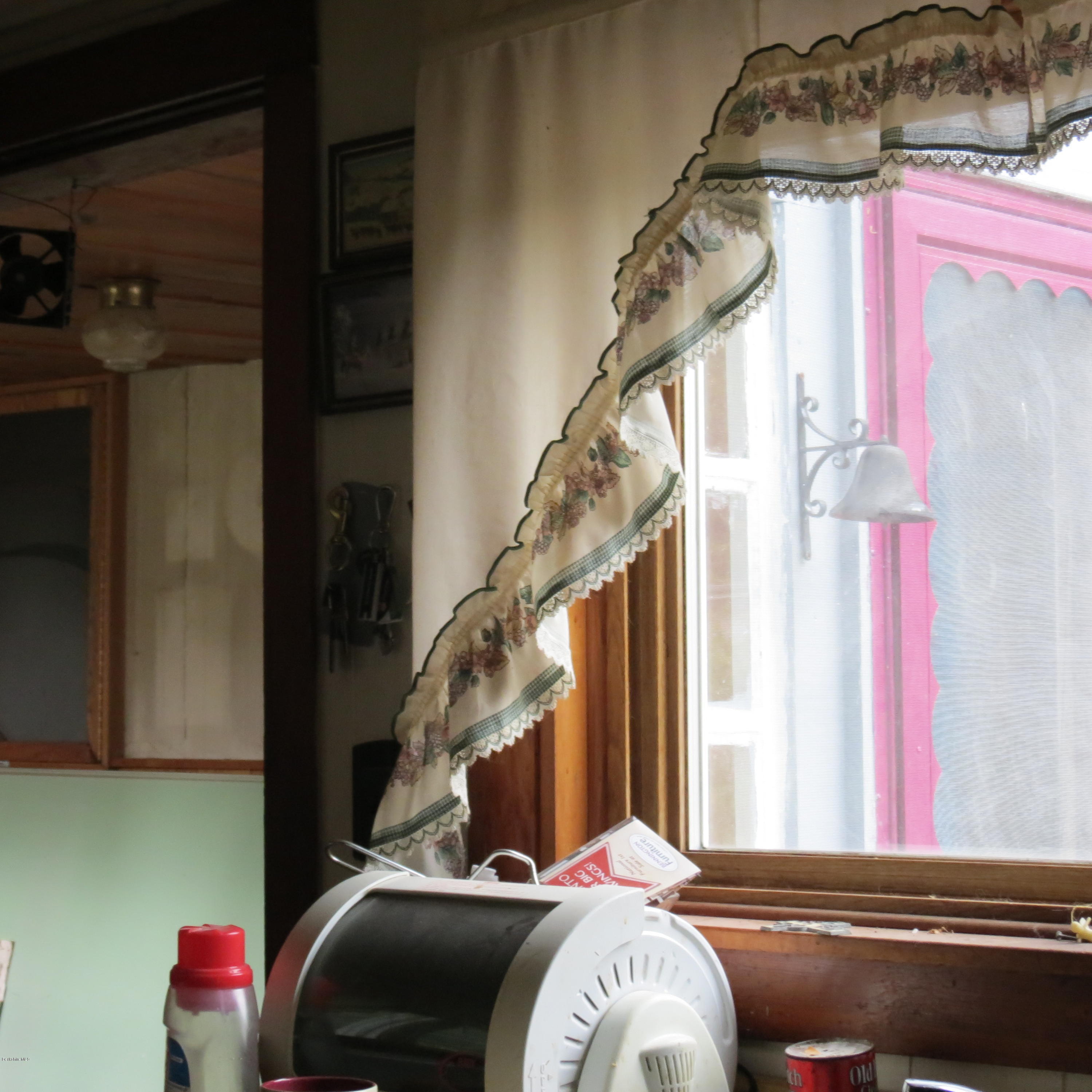 4733 Main Road Stamford, VT 05352 - Photo 23 of 39 a view of livingroom with furniture and a window