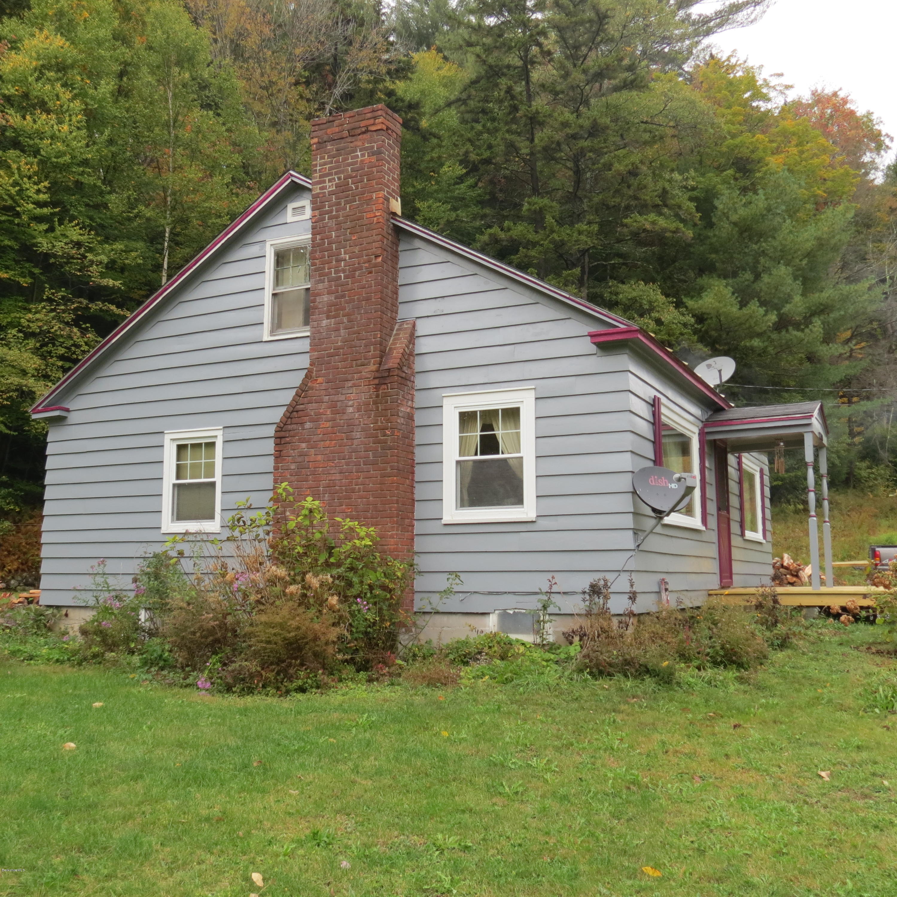 4733 Main Road Stamford, VT 05352 - Photo 29 of 39 a view of a house with a yard