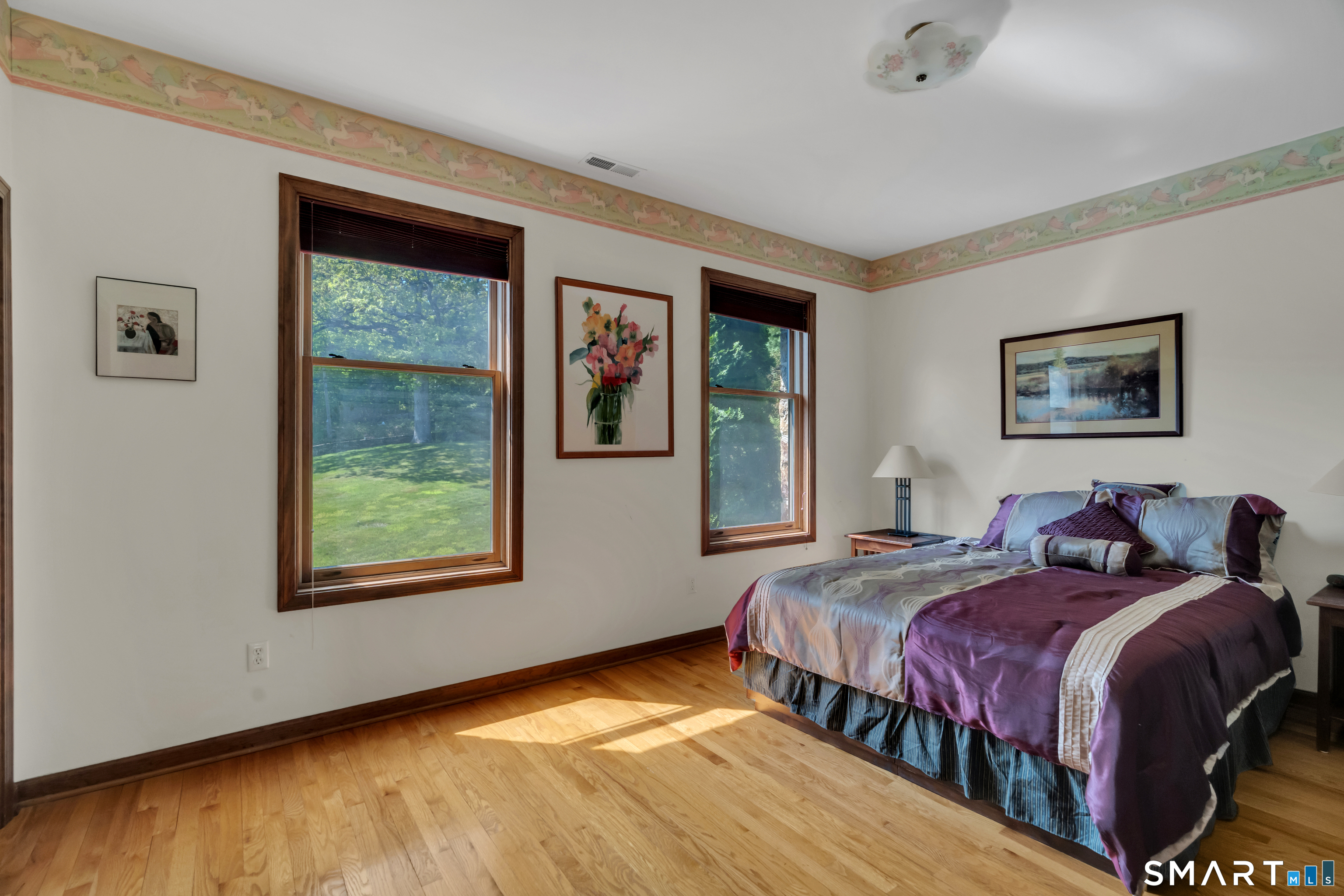 194 Quaker Farms Road Oxford, CT 06478 - Photo 23 of 40 a bedroom with a bed and a window