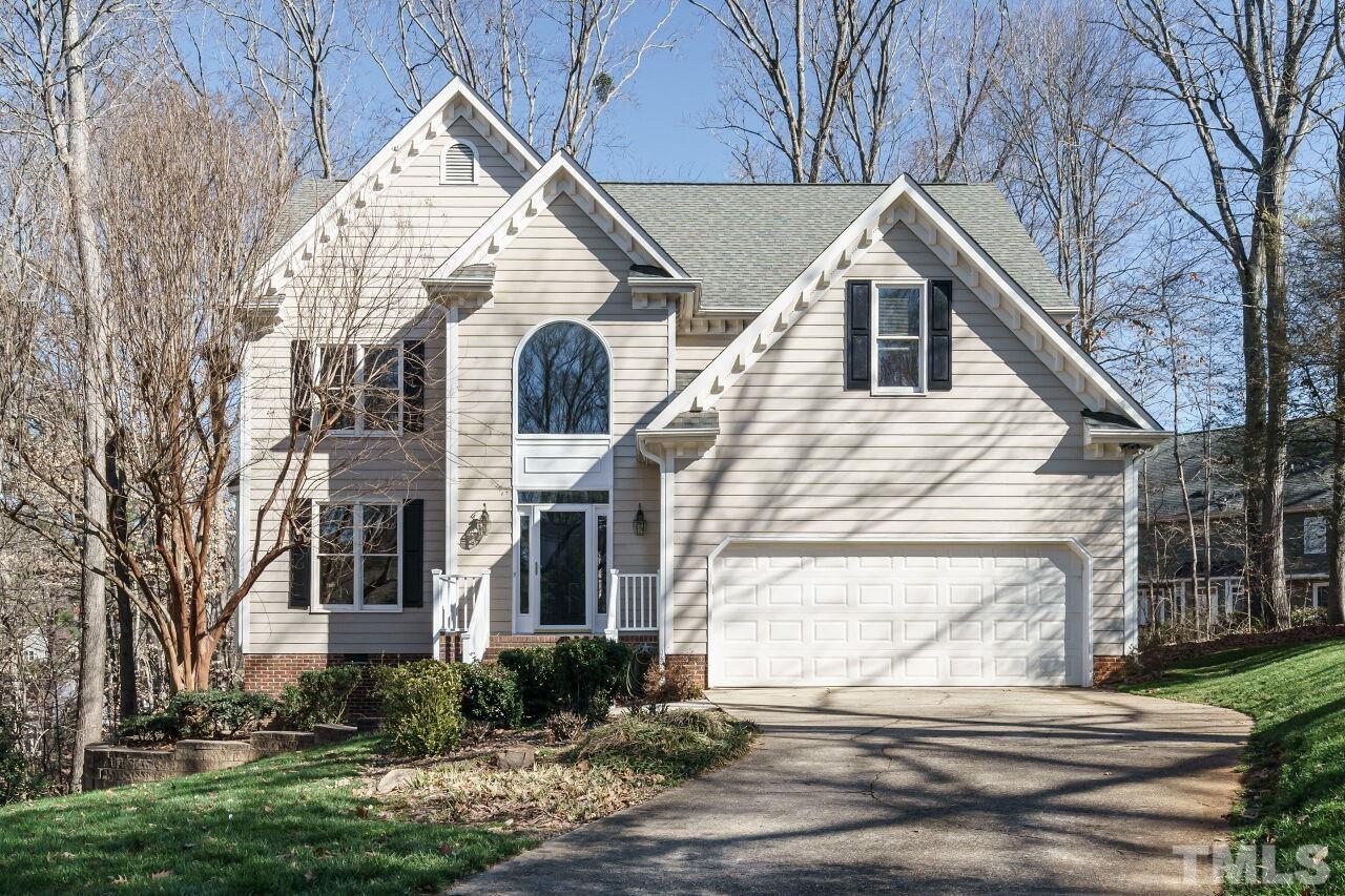 7920 Sutcliffe Drive Raleigh, NC 27613 - Photo 1 of 37 Situated in wooded cul de sac lot