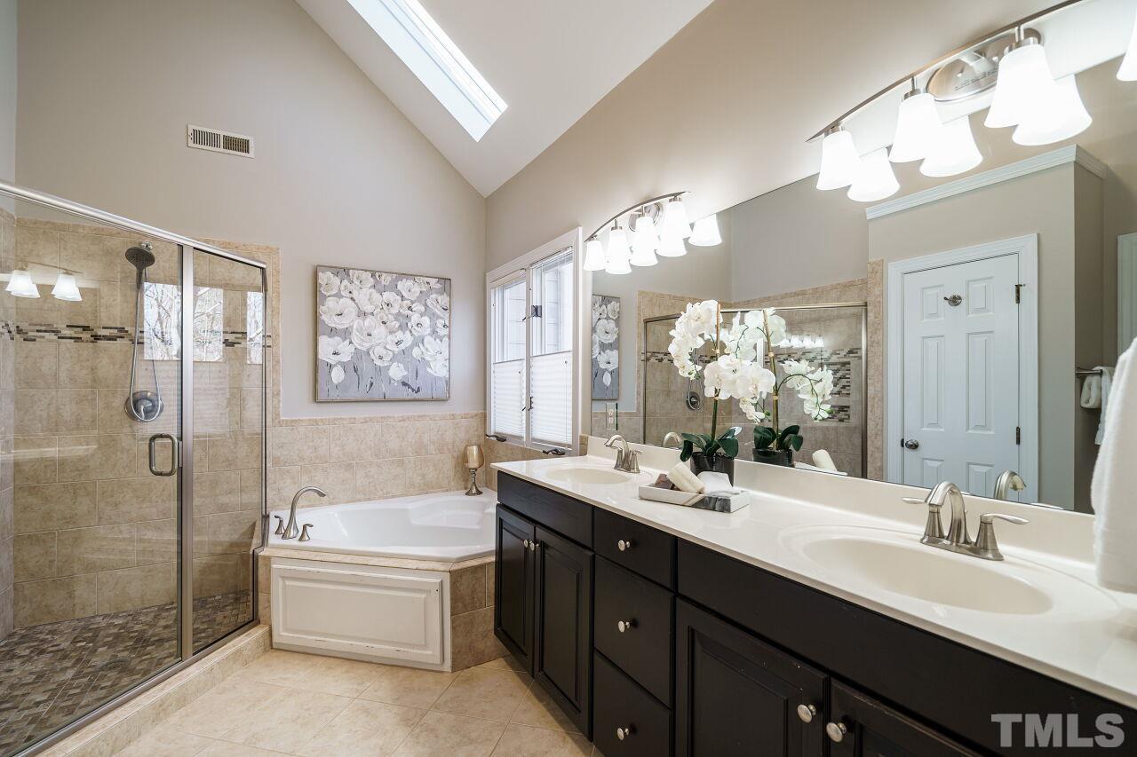 7920 Sutcliffe Drive Raleigh, NC 27613 - Photo 20 of 37 Renovated bathroom