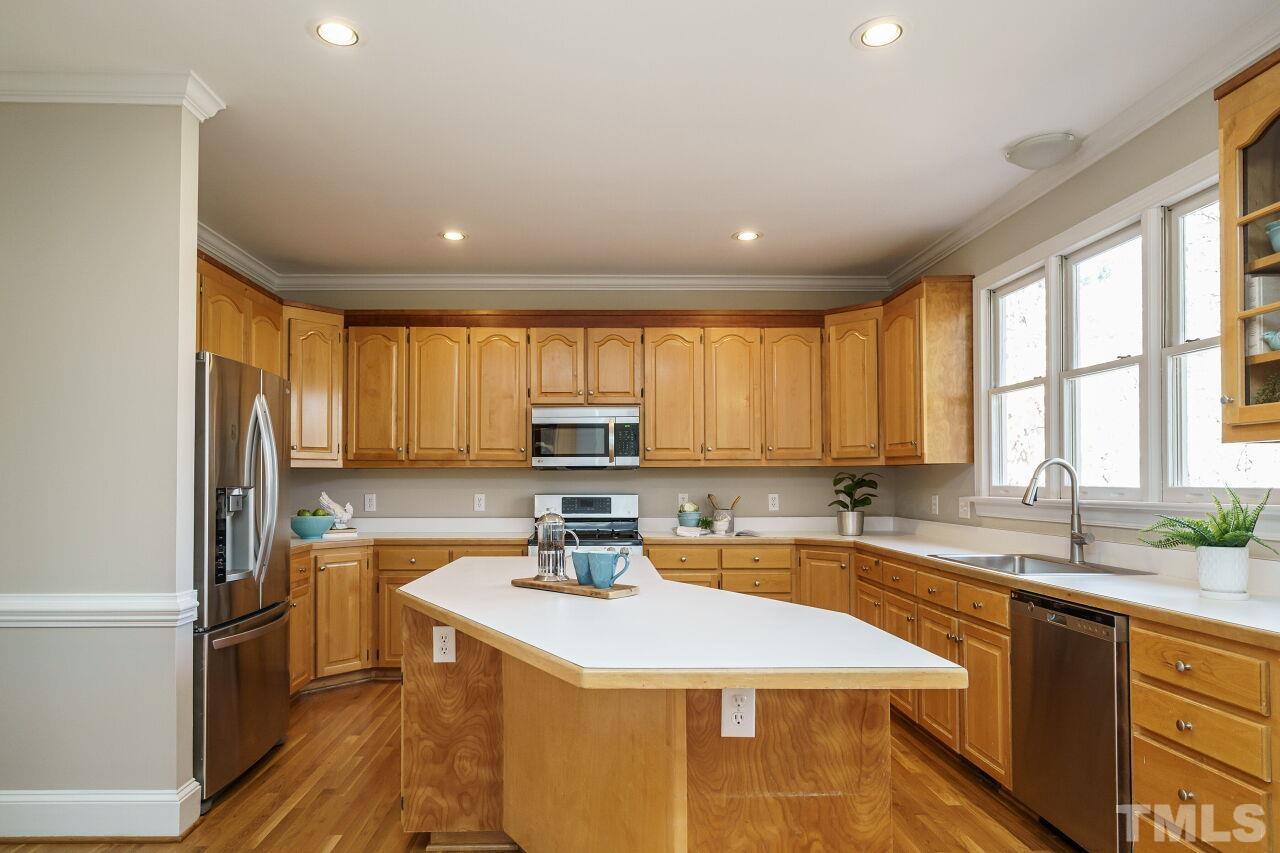 7920 Sutcliffe Drive Raleigh, NC 27613 - Photo 6 of 37 Plenty of cabinets and drawers