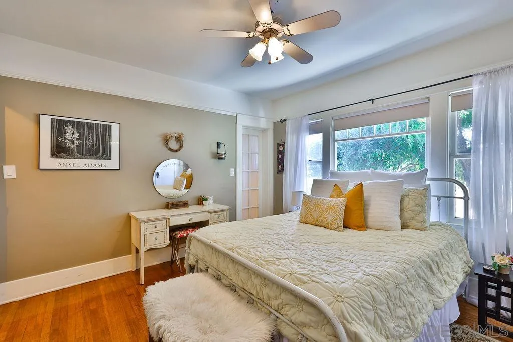 1305 Ashley Road Ramona, CA 92065 - Photo 19 of 72 a bedroom with a bed and a table