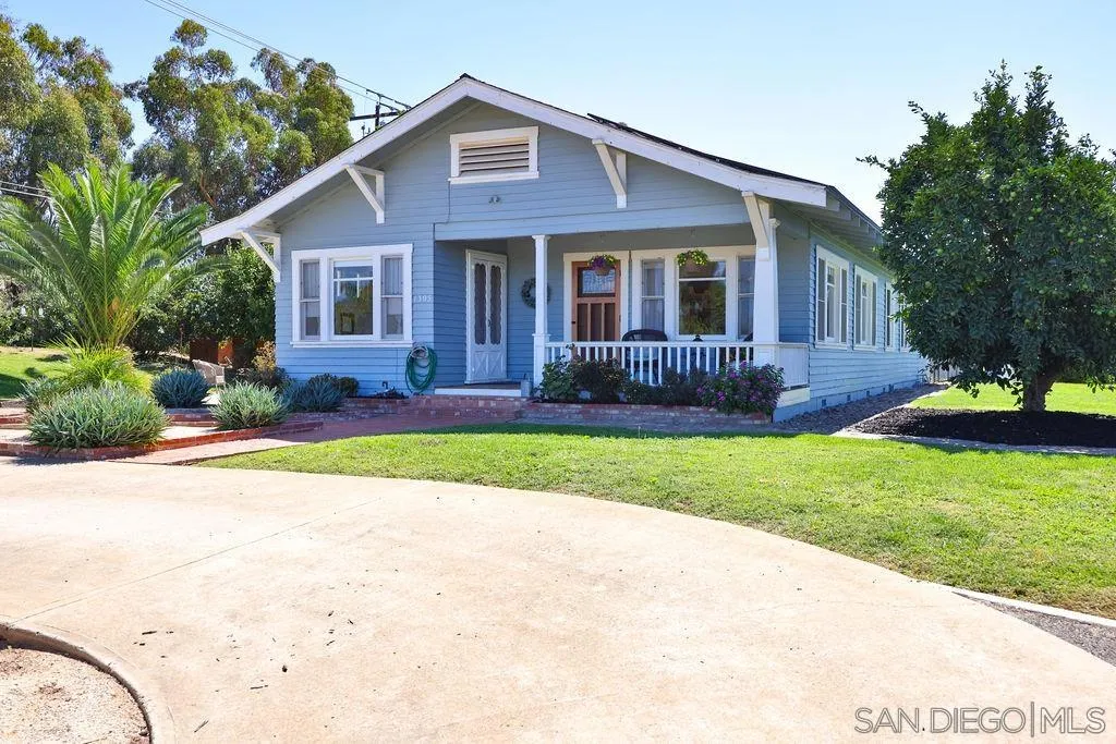 1305 Ashley Road Ramona, CA 92065 - Photo 2 of 72 a view of a house with a yard and potted plants
