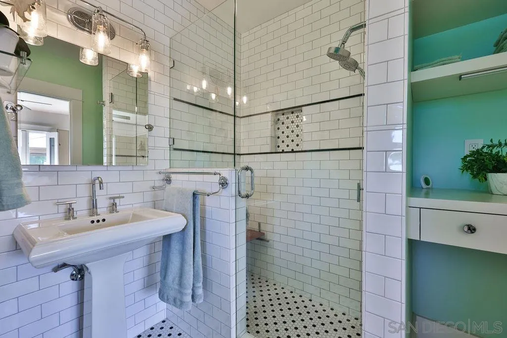 1305 Ashley Road Ramona, CA 92065 - Photo 31 of 72 a bathroom with a sink shower and a mirror