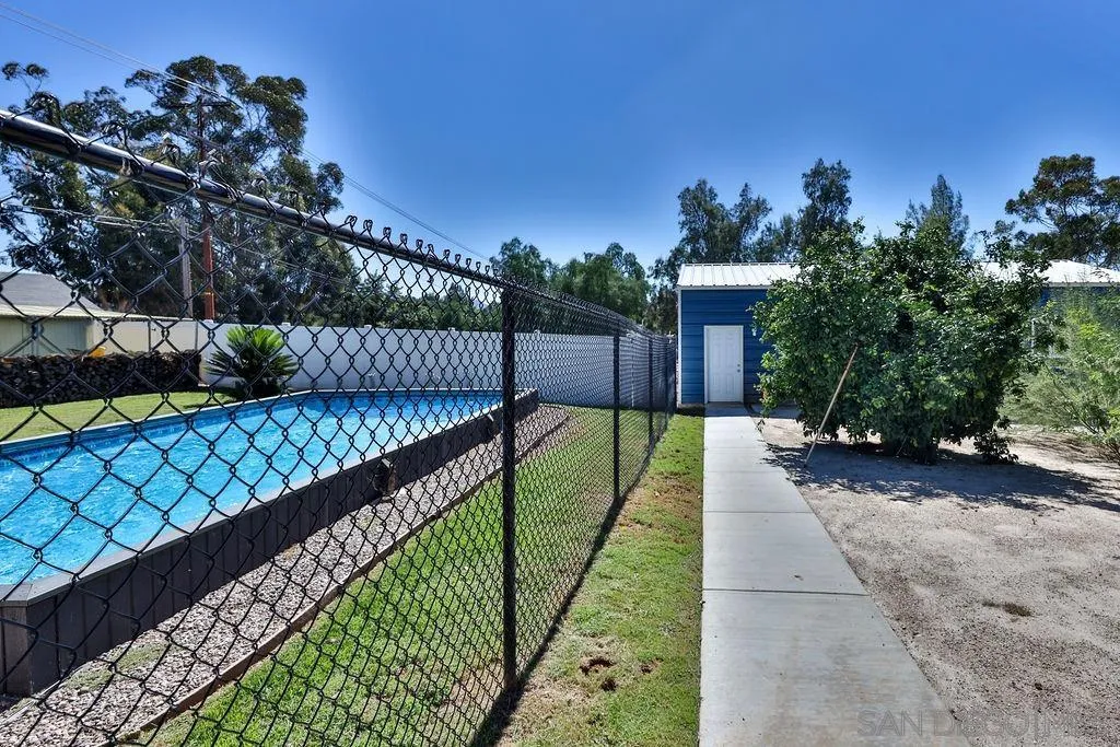 1305 Ashley Road Ramona, CA 92065 - Photo 42 of 72 a balcony with tall trees in the background
