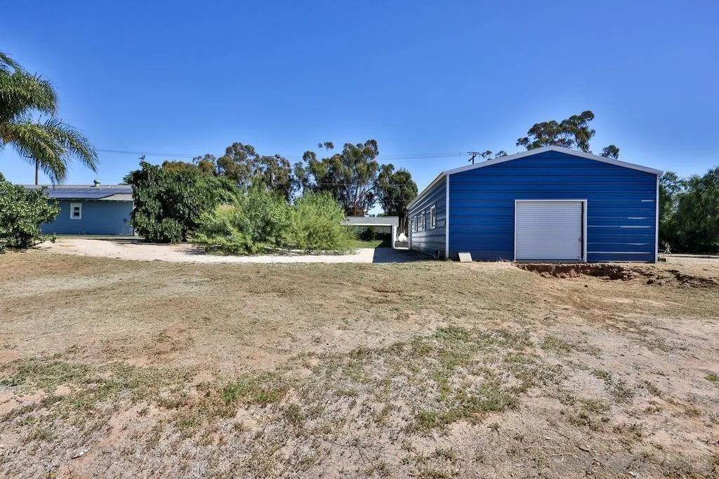 1305 Ashley Road Ramona, CA 92065 - Photo 52 of 72 a view of a house with a yard