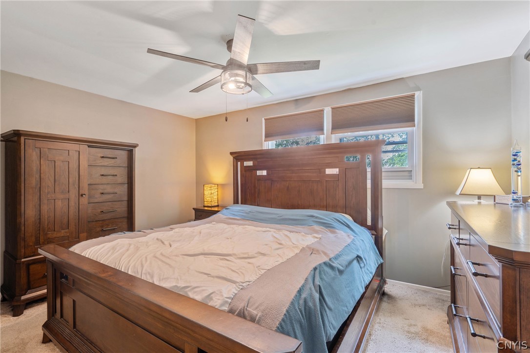 4346 Old Meadow Road Clay, NY 13041 - Photo 19 of 33 Now we enter the primary bedroom. This bedroom als