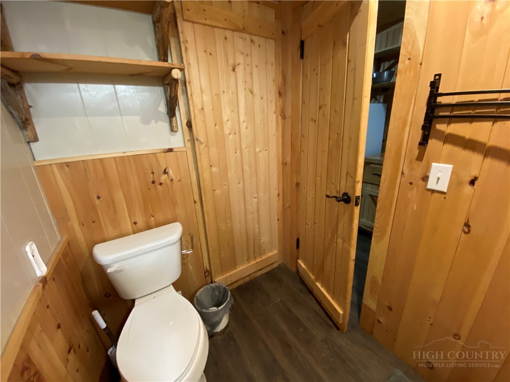 143 Ridge Crest Drive West Jefferson, NC 28694 - Photo 7 of 9 a white toilet sitting next to a shower