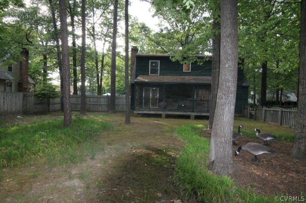 10907 Drayton Road Chester, VA 23831 - Photo 10 of 12 a view of backyard with green space