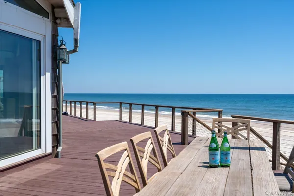 a view of a balcony dining area