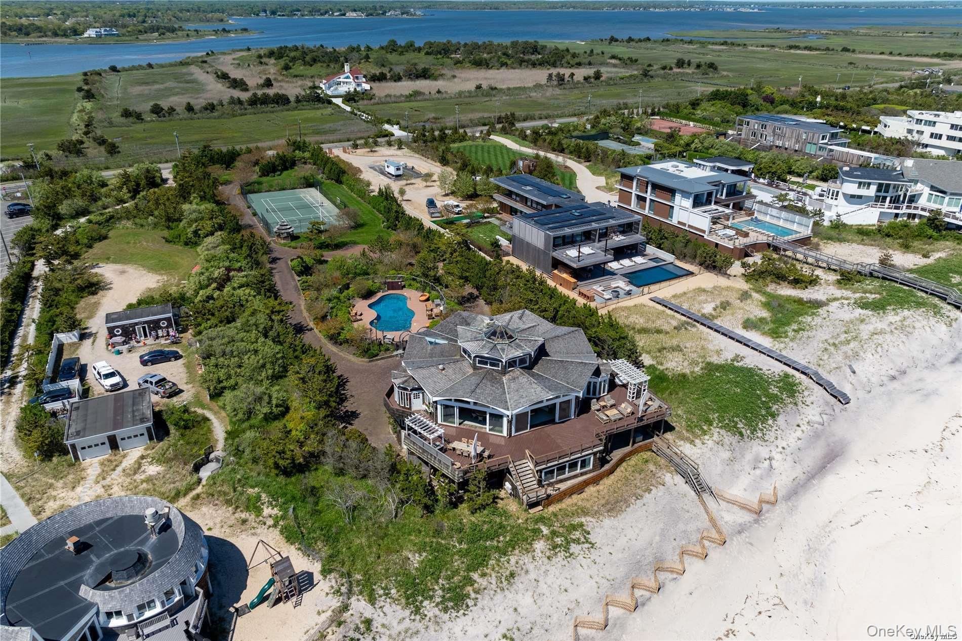 174 Dune Road Quogue, NY 11959 - Photo 33 of 35 an aerial view of residential houses with outdoor space