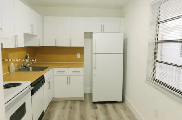 a bathroom with a shower and a toilet