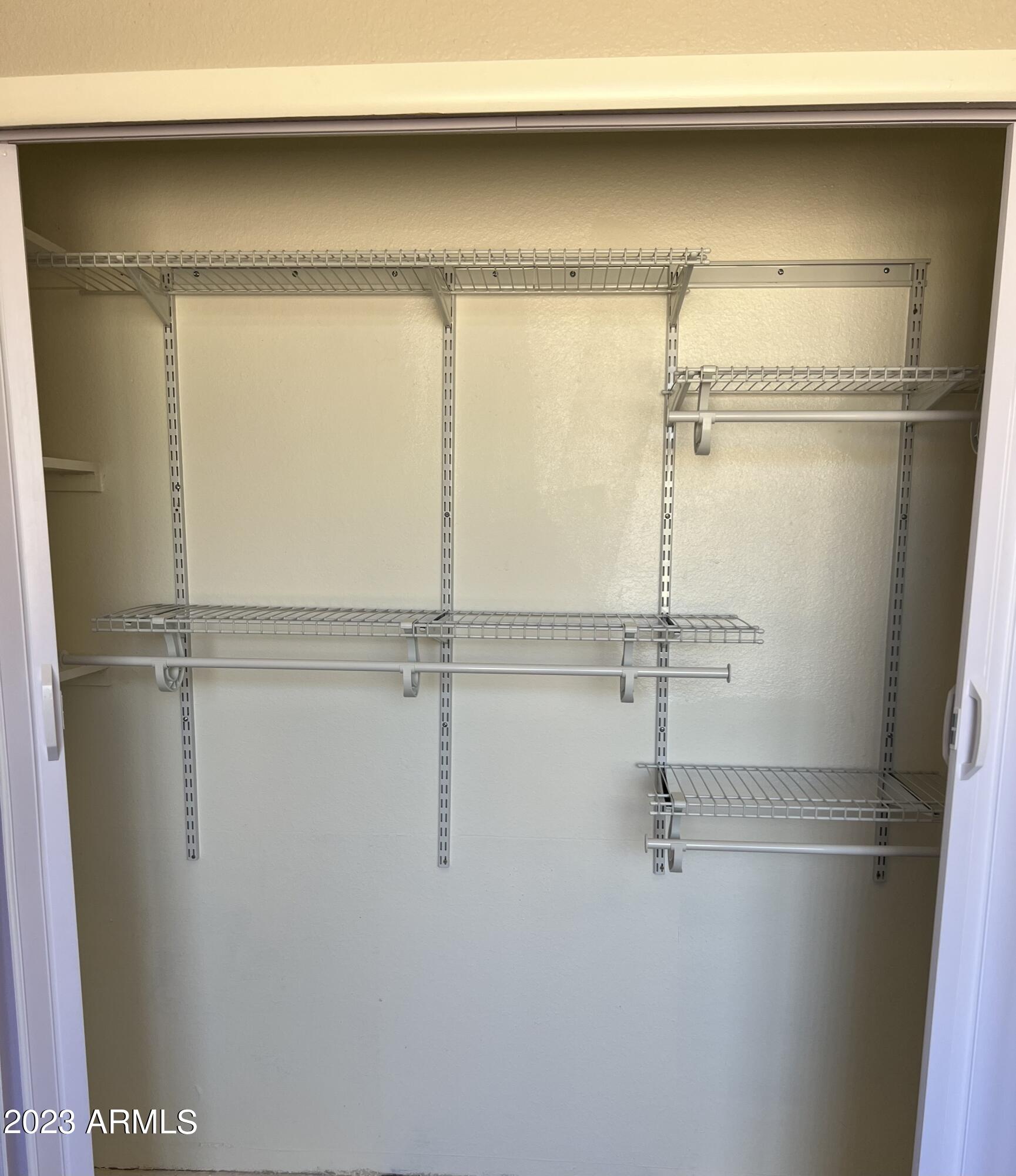 16013 South Desert Foothills Parkway, Unit 2090 Phoenix, AZ 85048 - Photo 25 of 43 a close view of closet