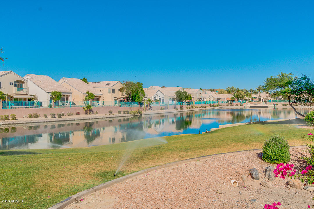 16013 South Desert Foothills Parkway, Unit 2090 Phoenix, AZ 85048 - Photo 3 of 43 a view of swimming pool with a yard