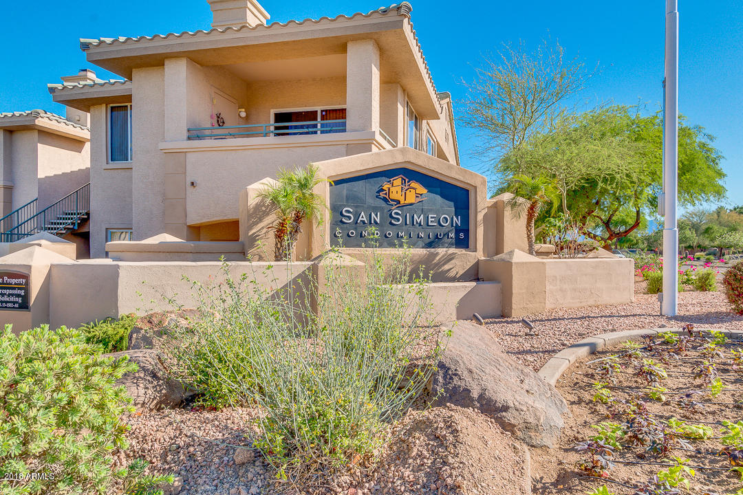 16013 South Desert Foothills Parkway, Unit 2090 Phoenix, AZ 85048 - Photo 32 of 43 front view of a house with a yard