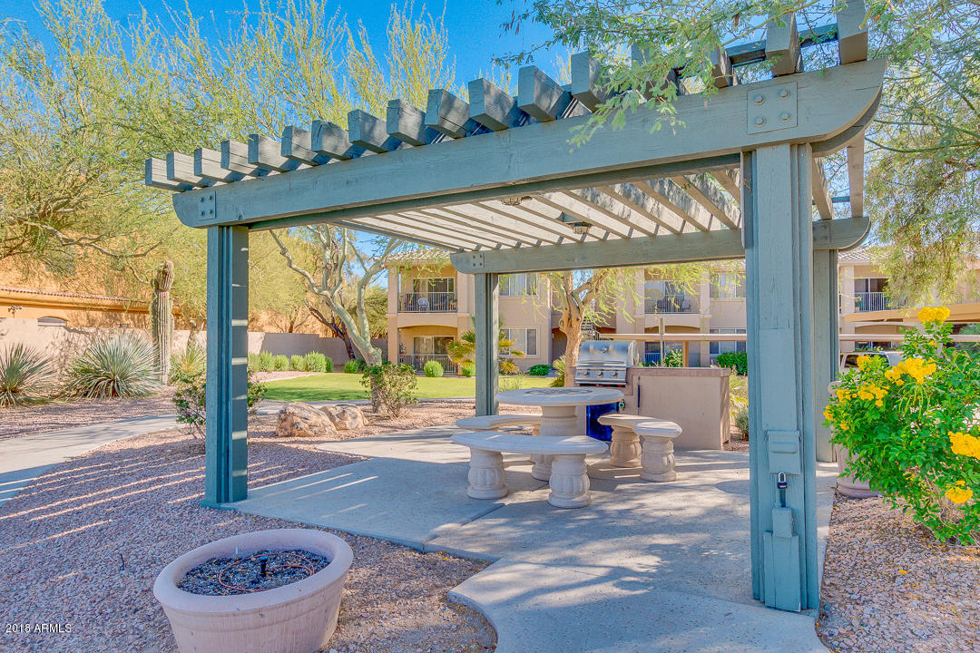 16013 South Desert Foothills Parkway, Unit 2090 Phoenix, AZ 85048 - Photo 38 of 43 a building outdoor space with a patio