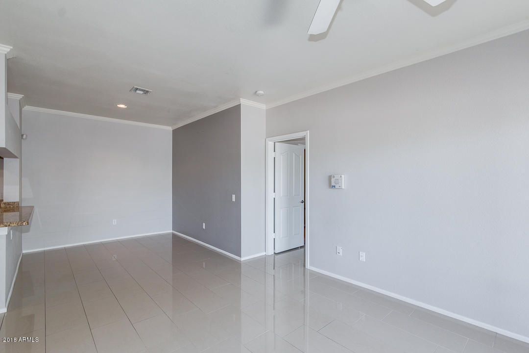 16013 South Desert Foothills Parkway, Unit 2090 Phoenix, AZ 85048 - Photo 8 of 43 a view of an empty room