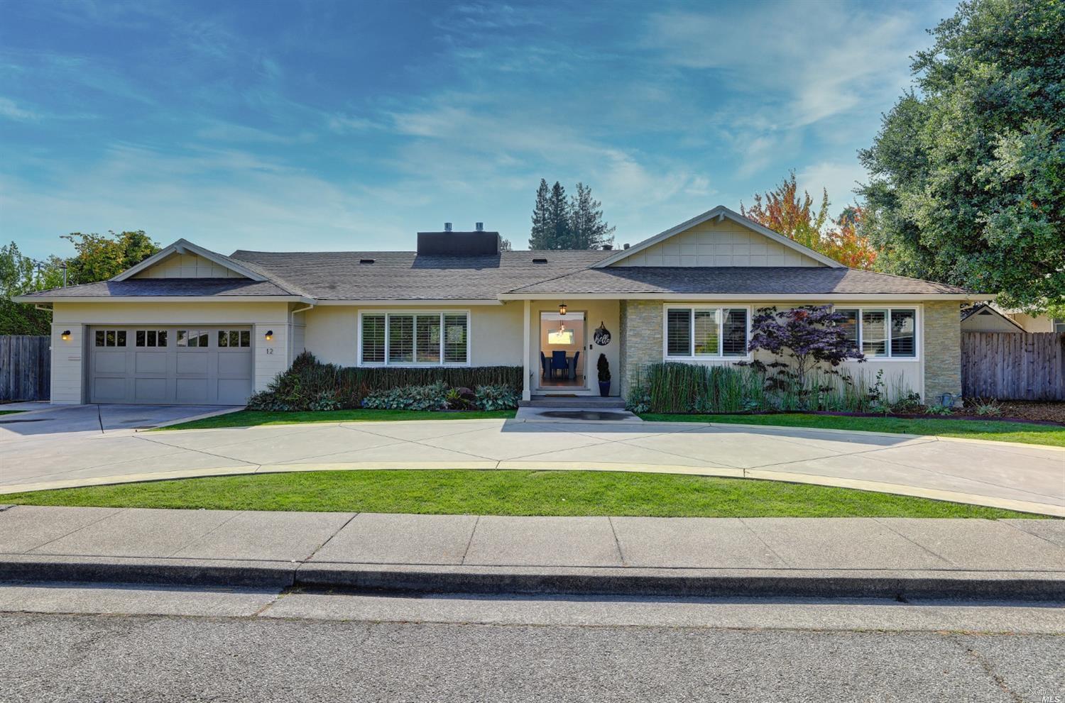 12 Loma Linda Road San Rafael, CA 94901 - Photo 1 of 1 a front view of a house with a yard and garage