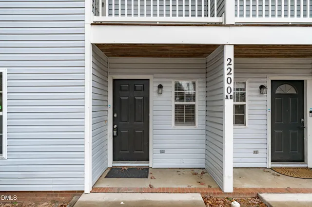 a front view of a house with a garage