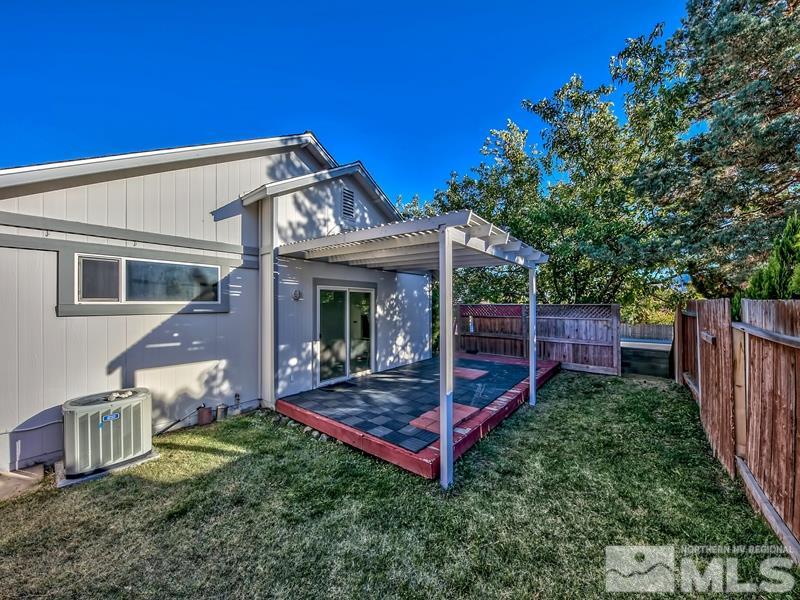 2301 Cordilla Court Reno, NV 89523 - Photo 17 of 18 a view of a house with backyard and porch