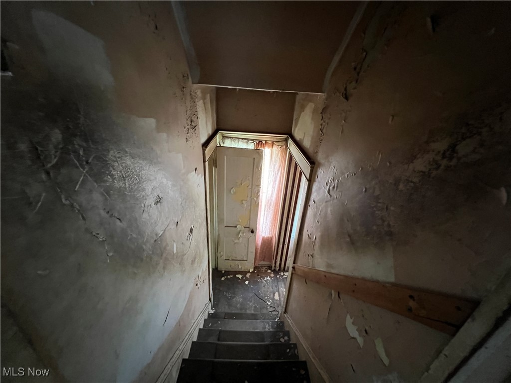 1246 Carlyon Road Cleveland, OH 44112 - Photo 8 of 16 Stairs and hallway