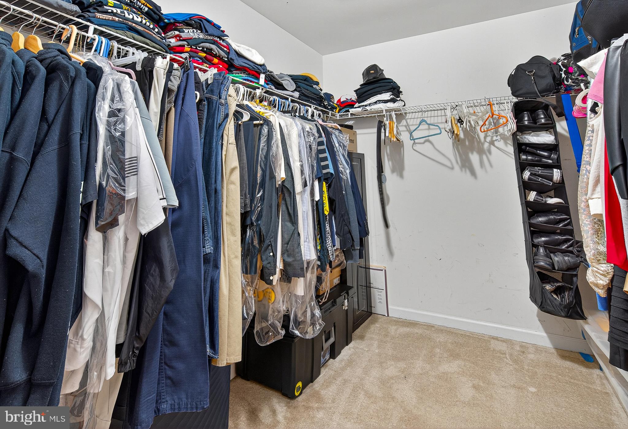 671 English Ivy Way Aberdeen, MD 21001 - Photo 15 of 30 a view of walk in closet with clothes
