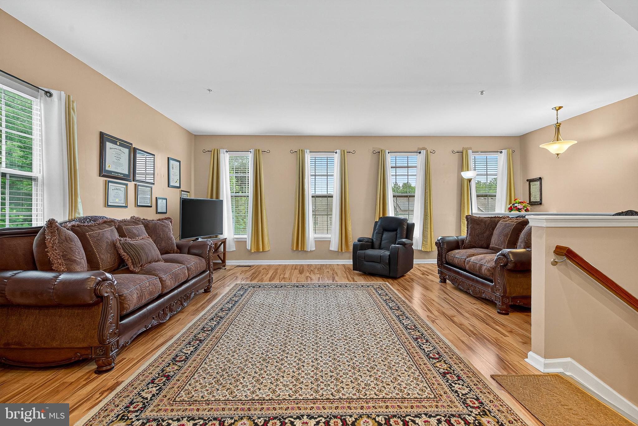 671 English Ivy Way Aberdeen, MD 21001 - Photo 2 of 30 a living room with furniture and a rug