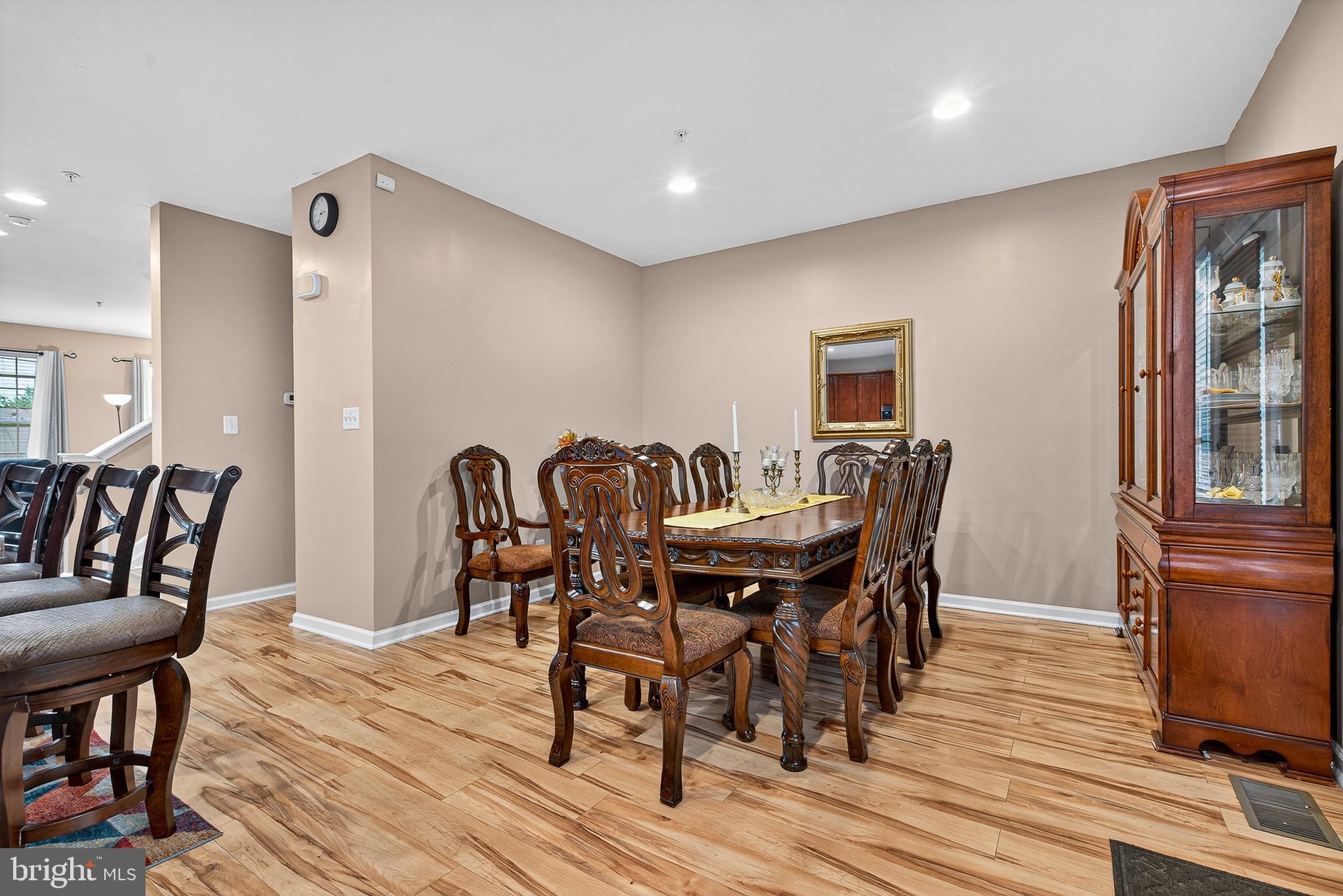 671 English Ivy Way Aberdeen, MD 21001 - Photo 7 of 30 a view of a a dining room with furniture window and wooden floor
