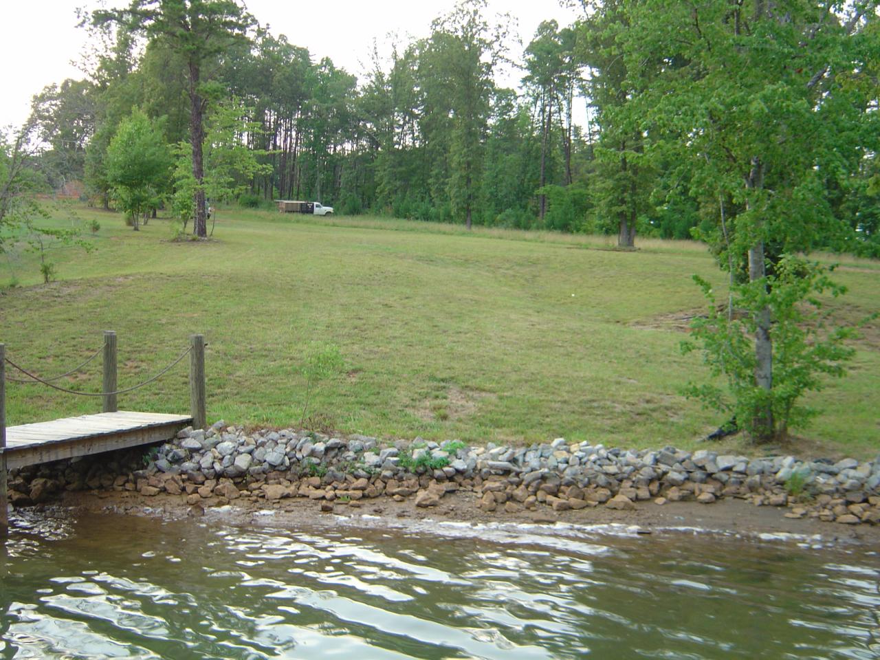 Lot 1 Calypso Road Moneta, VA 24121 - Photo 3 of 6 a view of a lake view with a large trees
