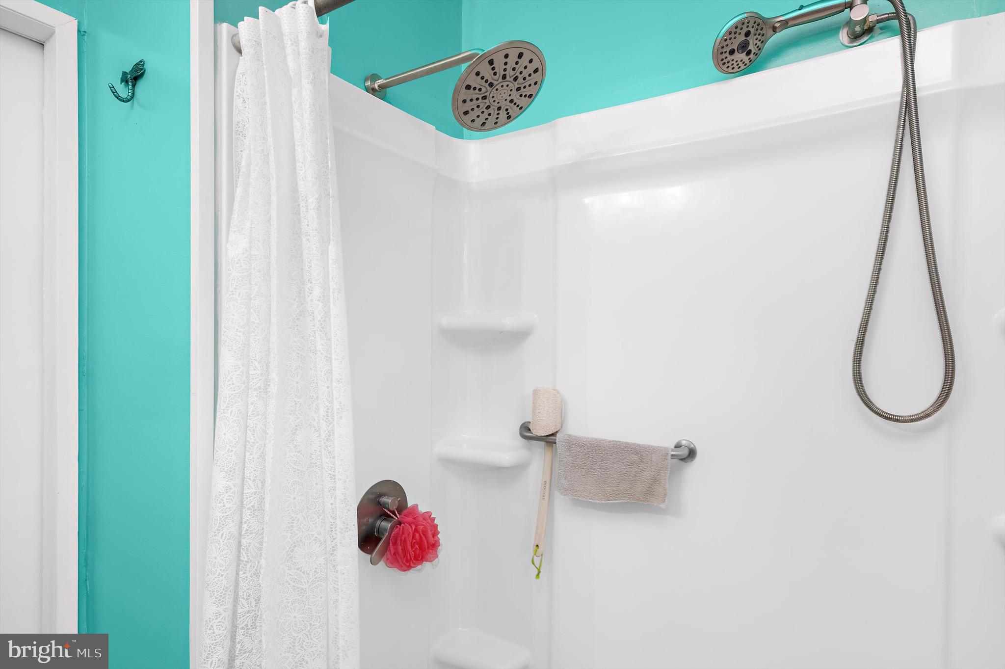 902 Joppa Farm Road Joppa, MD 21085 - Photo 19 of 34 a bathroom with a shower and a window