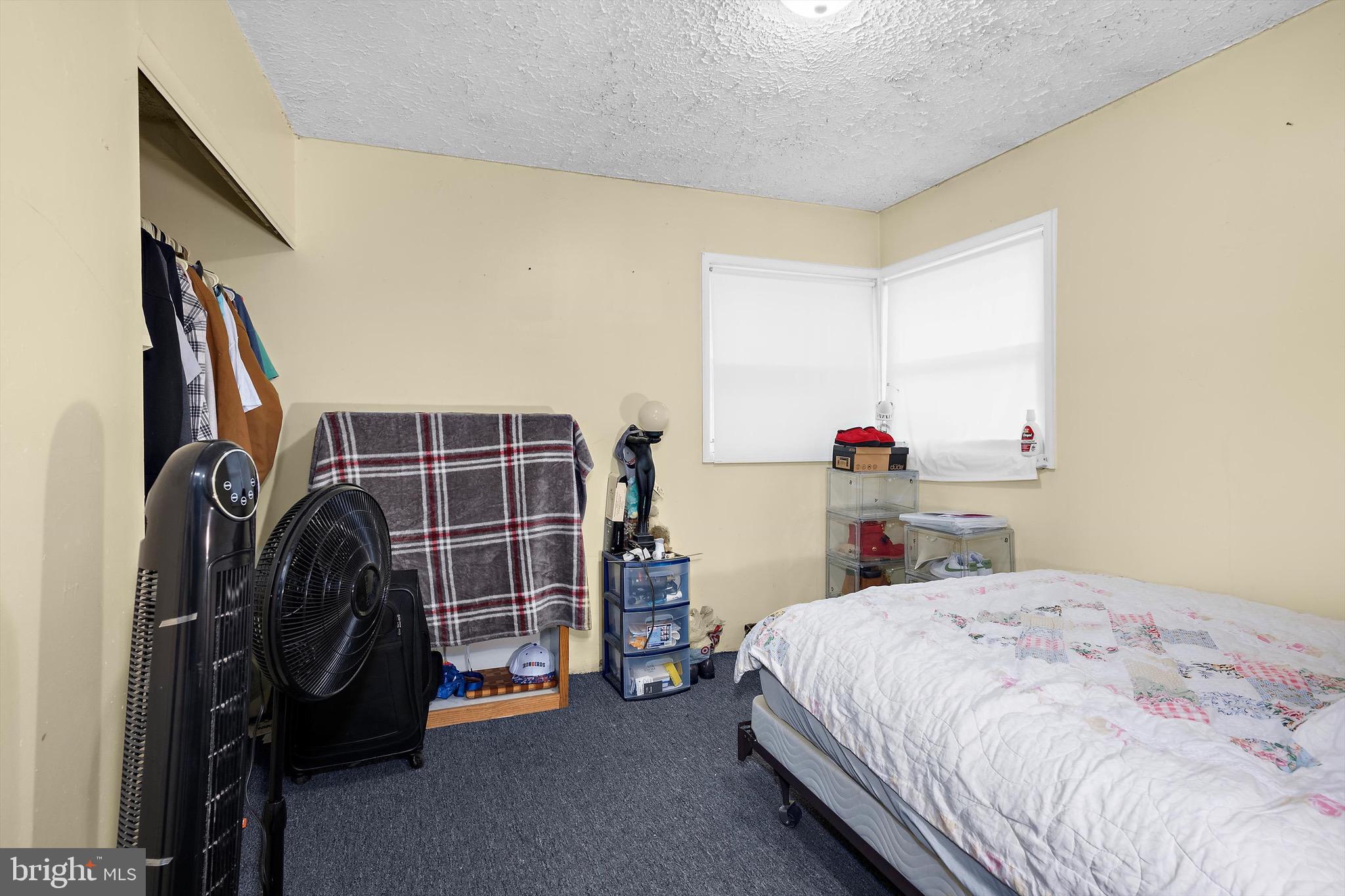 902 Joppa Farm Road Joppa, MD 21085 - Photo 23 of 34 a bedroom with a bed and a closet