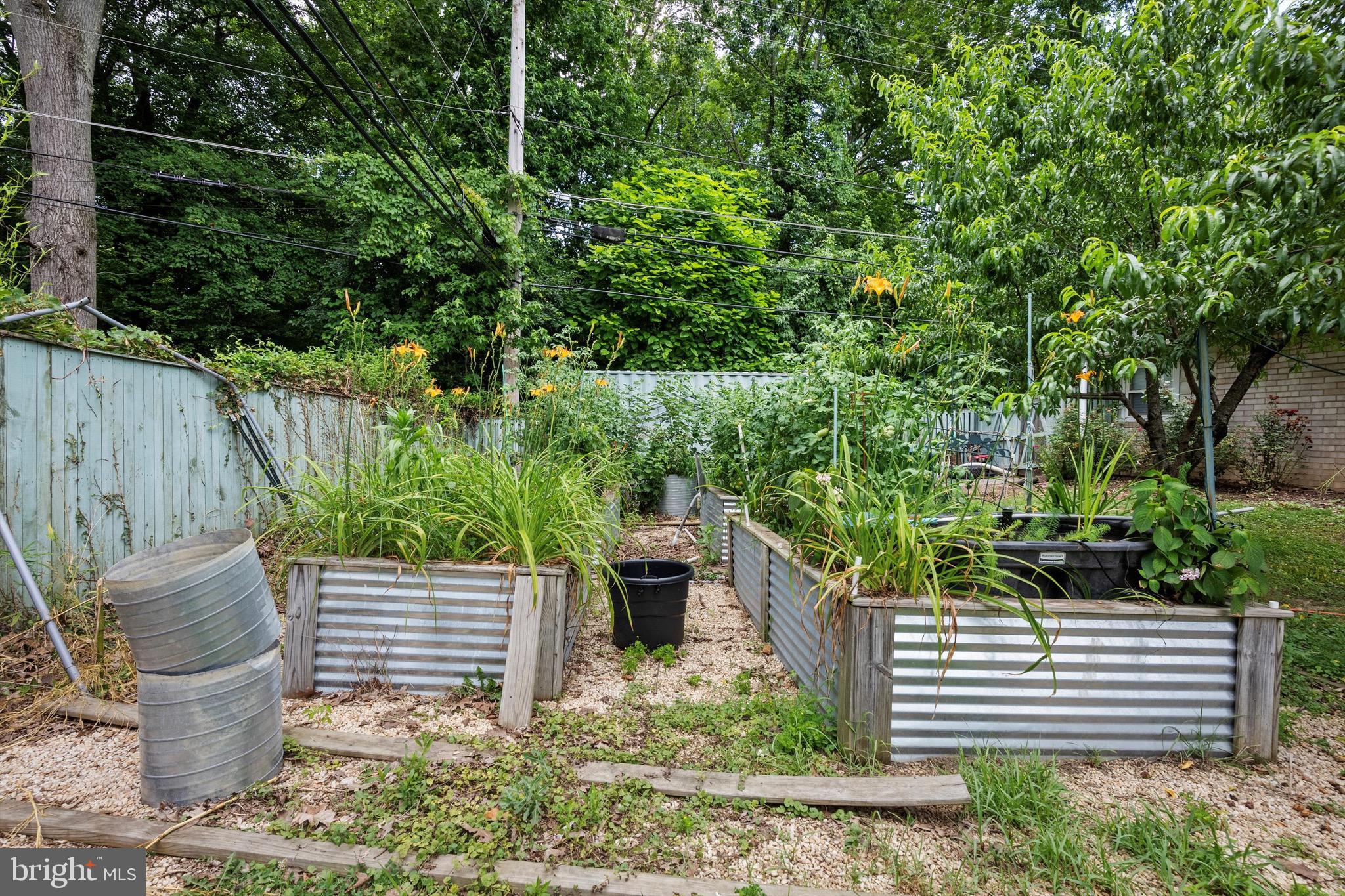 902 Joppa Farm Road Joppa, MD 21085 - Photo 28 of 34 a backyard of a house with lots of green space