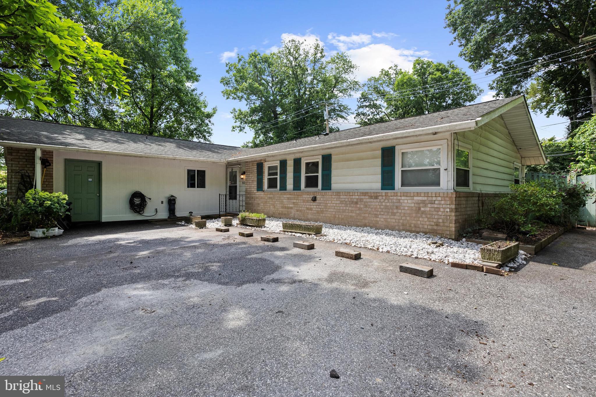 902 Joppa Farm Road Joppa, MD 21085 - Photo 3 of 34 a view of a house with a yard and a tree