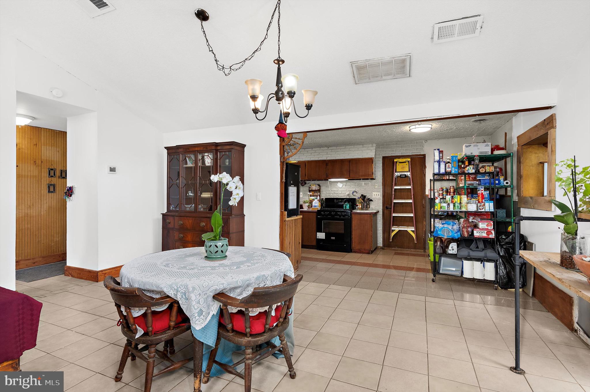 902 Joppa Farm Road Joppa, MD 21085 - Photo 10 of 34 a view of a dining room with furniture
