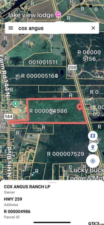 a view of swimming pool with a yard and seating area