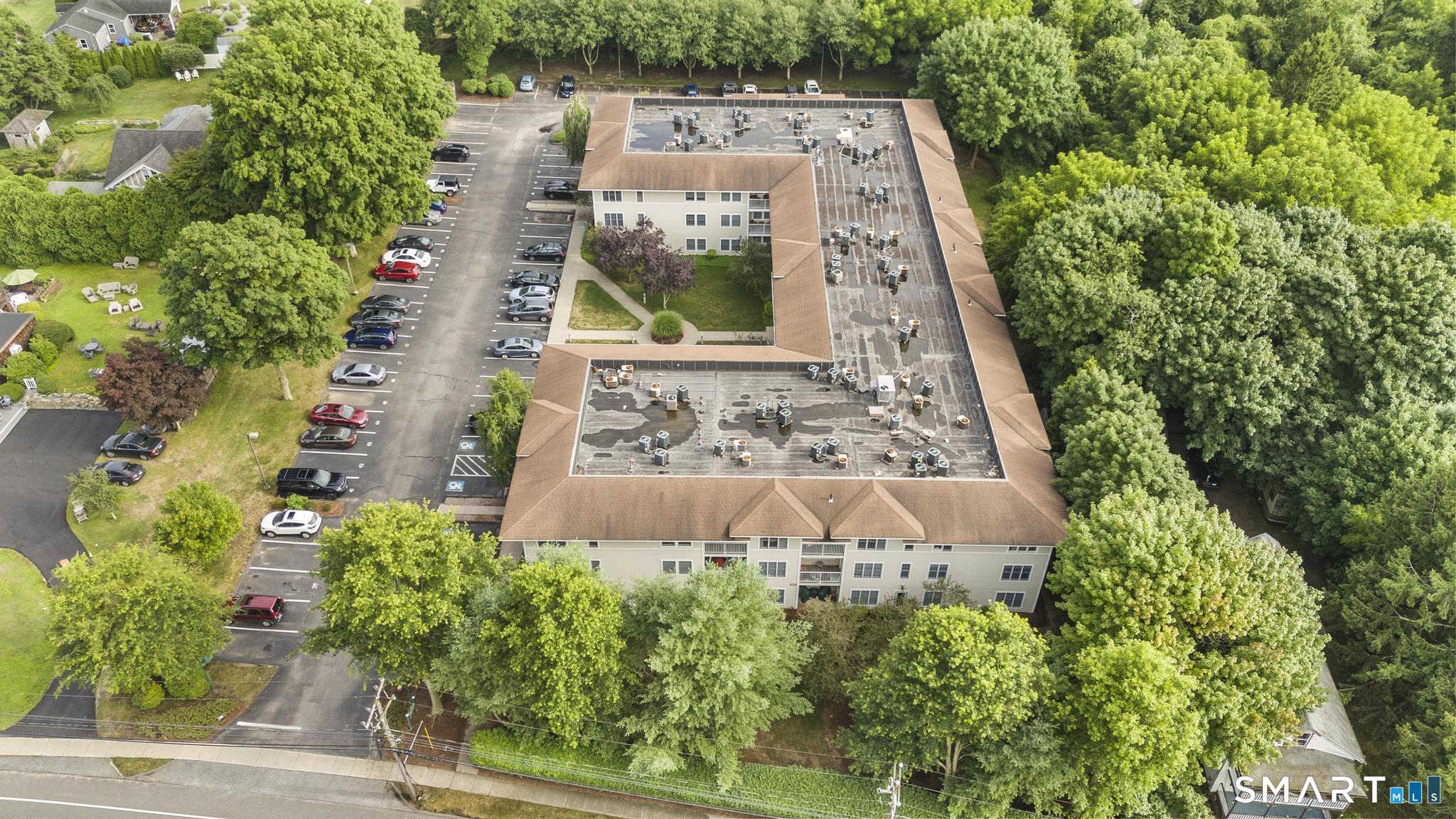 468 Main Street, Unit 111 East Lyme, CT 06357 - Photo 14 of 37 an aerial view of a house