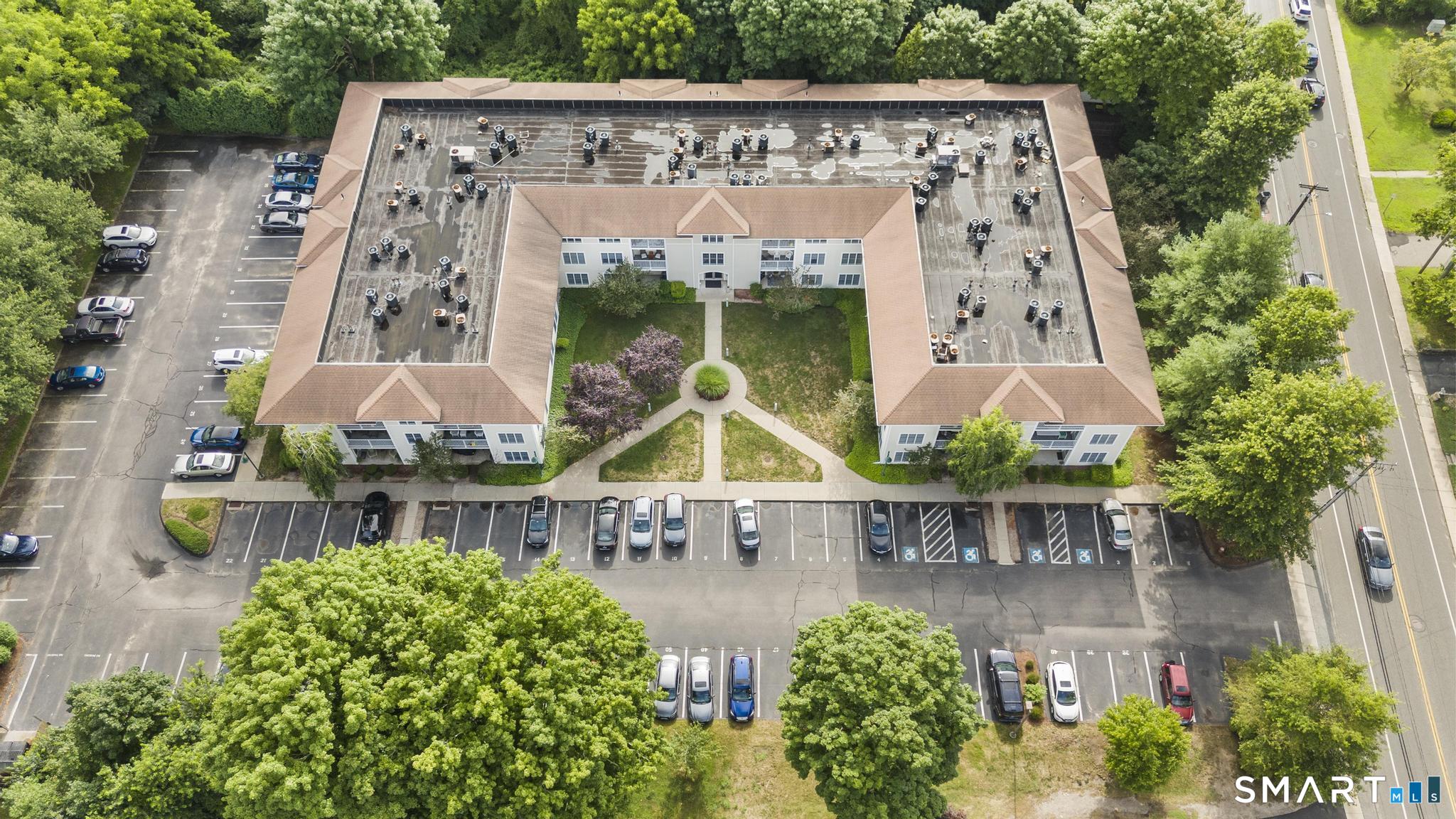 468 Main Street, Unit 111 East Lyme, CT 06357 - Photo 15 of 37 front view of a house with a porch