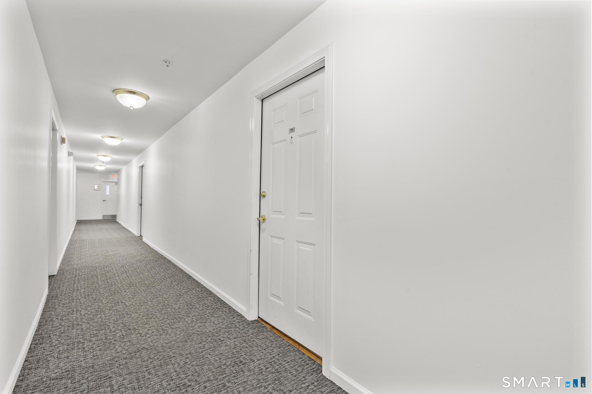 468 Main Street, Unit 111 East Lyme, CT 06357 - Photo 17 of 37 a view of hallway