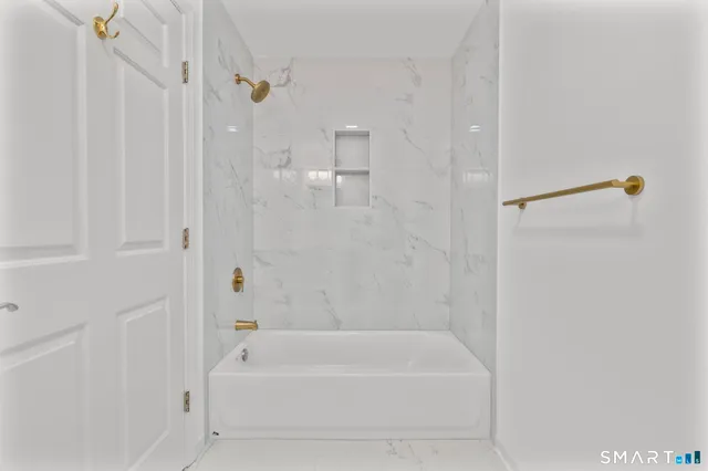 a bathroom with a bathtub