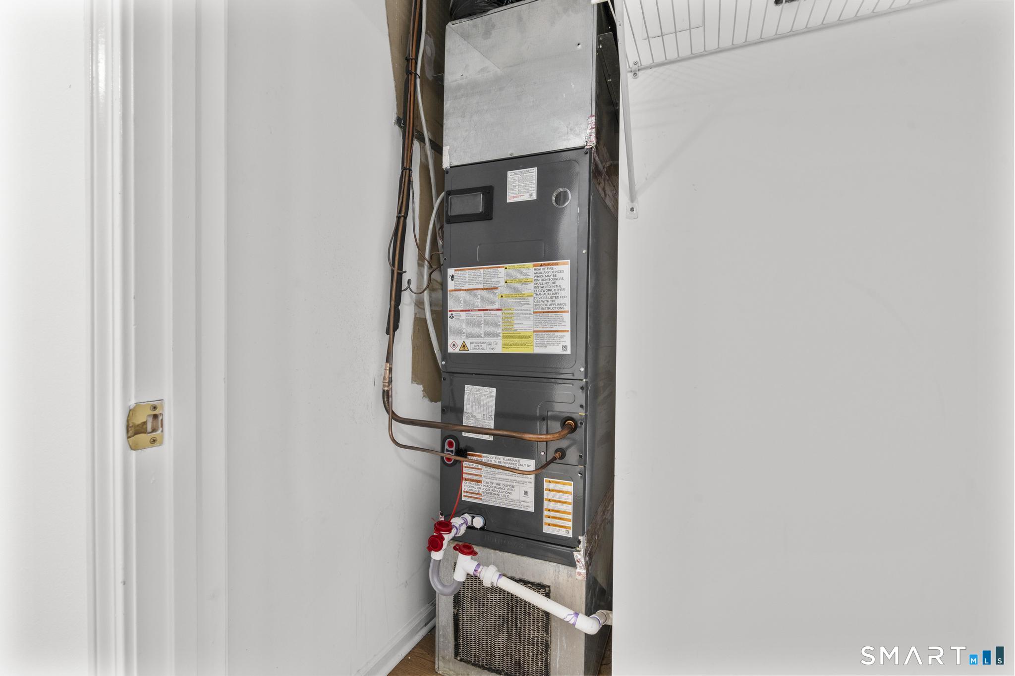 468 Main Street, Unit 111 East Lyme, CT 06357 - Photo 35 of 37 a room with storage and utility