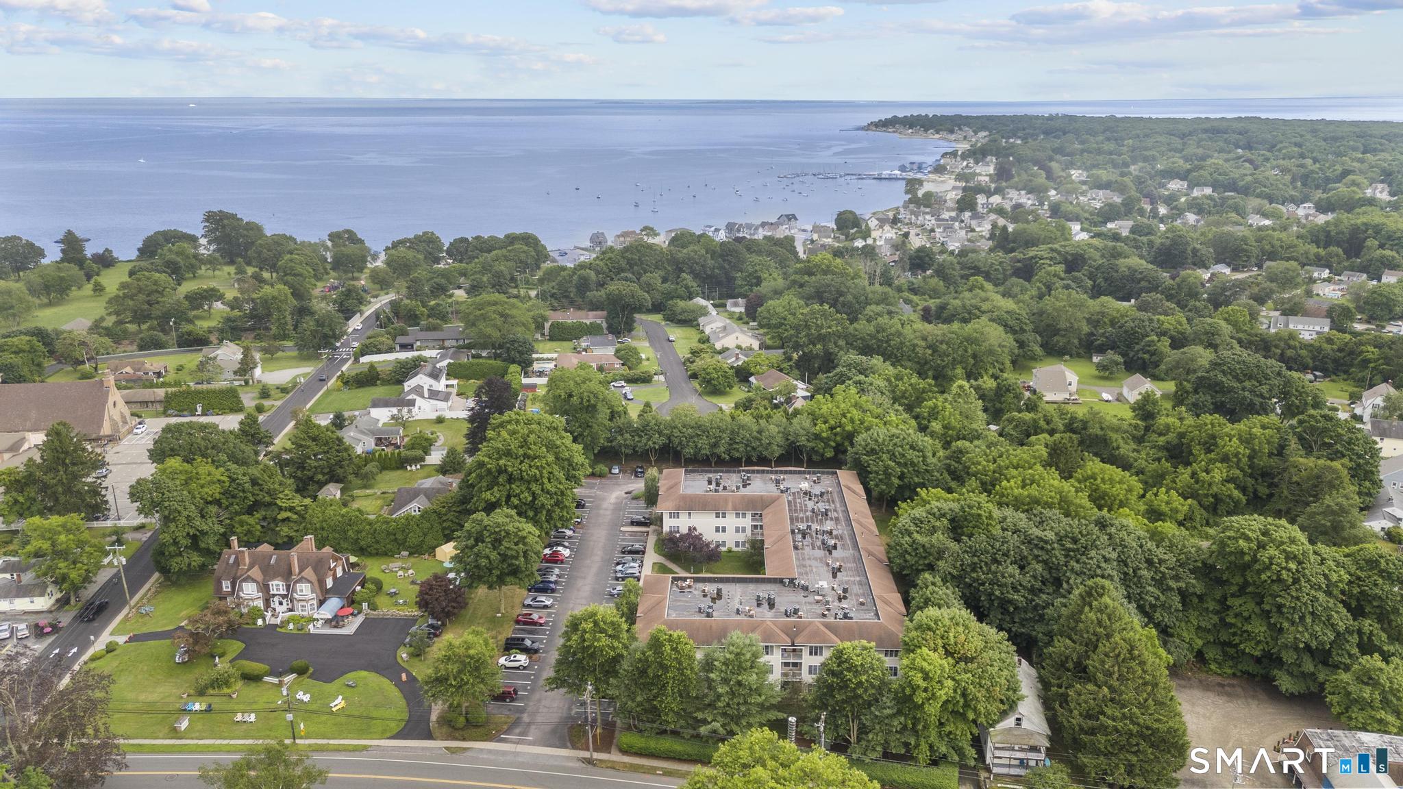 468 Main Street, Unit 111 East Lyme, CT 06357 - Photo 7 of 37 an aerial view of a city