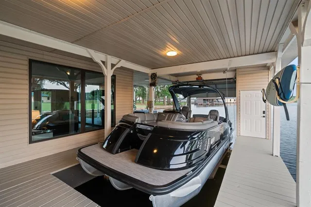 a view of a balcony and car parked in the balcony