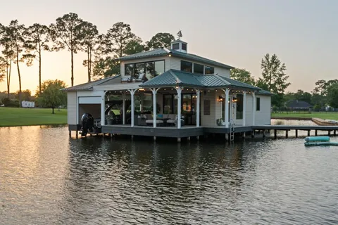 a view of a house with a lake view