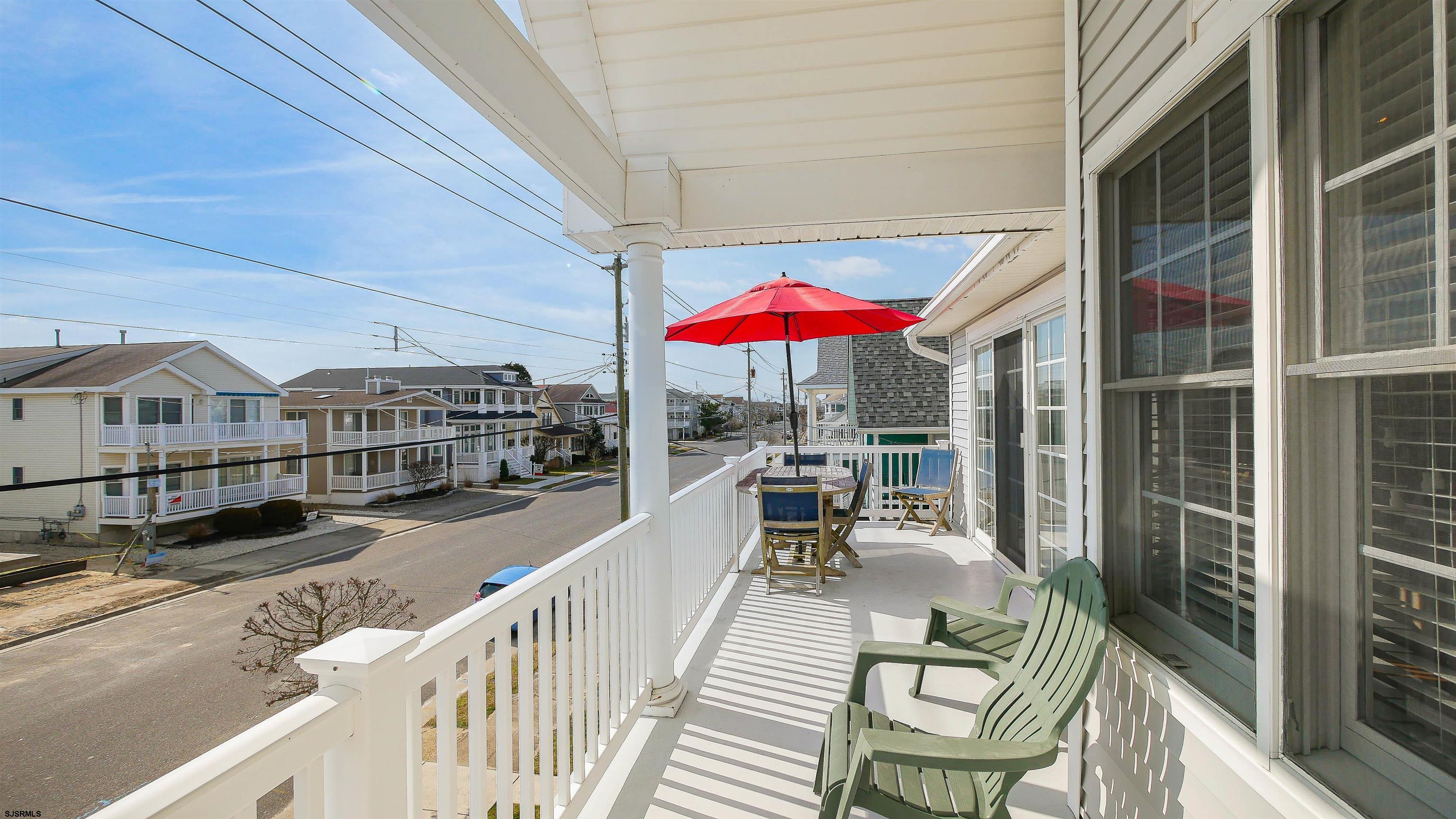 1910 Central Avenue, Unit B Ocean City, NJ 08226 - Photo 13 of 45 a view of a balcony with chairs